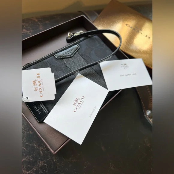 COACH black wristlet! Brand New with tags & care cards. Gold box. Beautiful! 🖤 - Picture 2 of 8